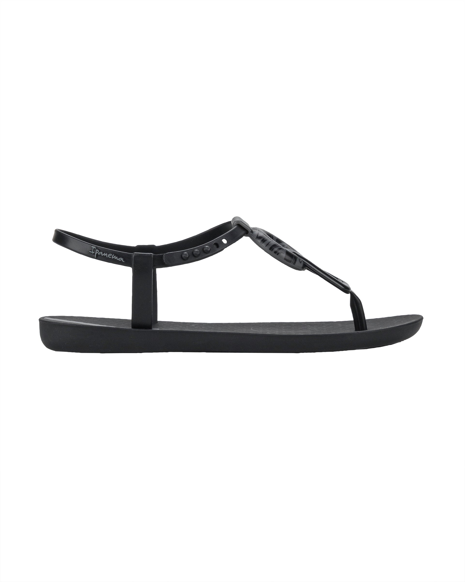Outer side view of a black Ipanema Class Marble women's t-strap sandal.