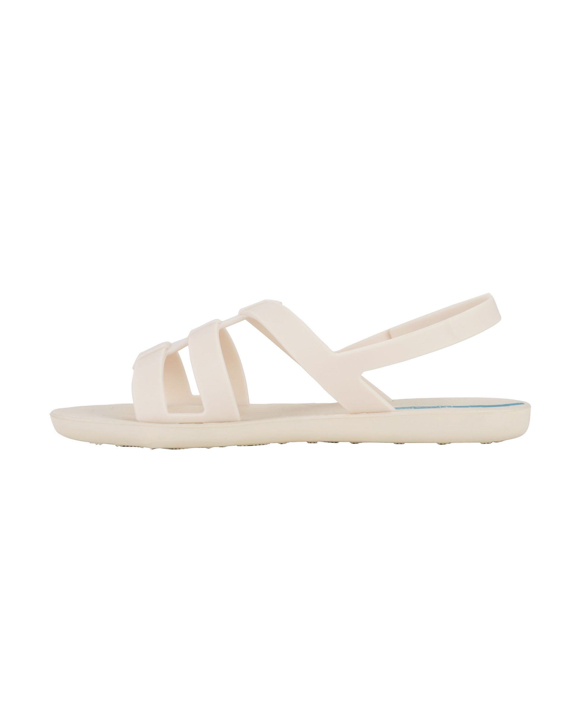 Inner side view of a beige Ipanema Style women's sandal.