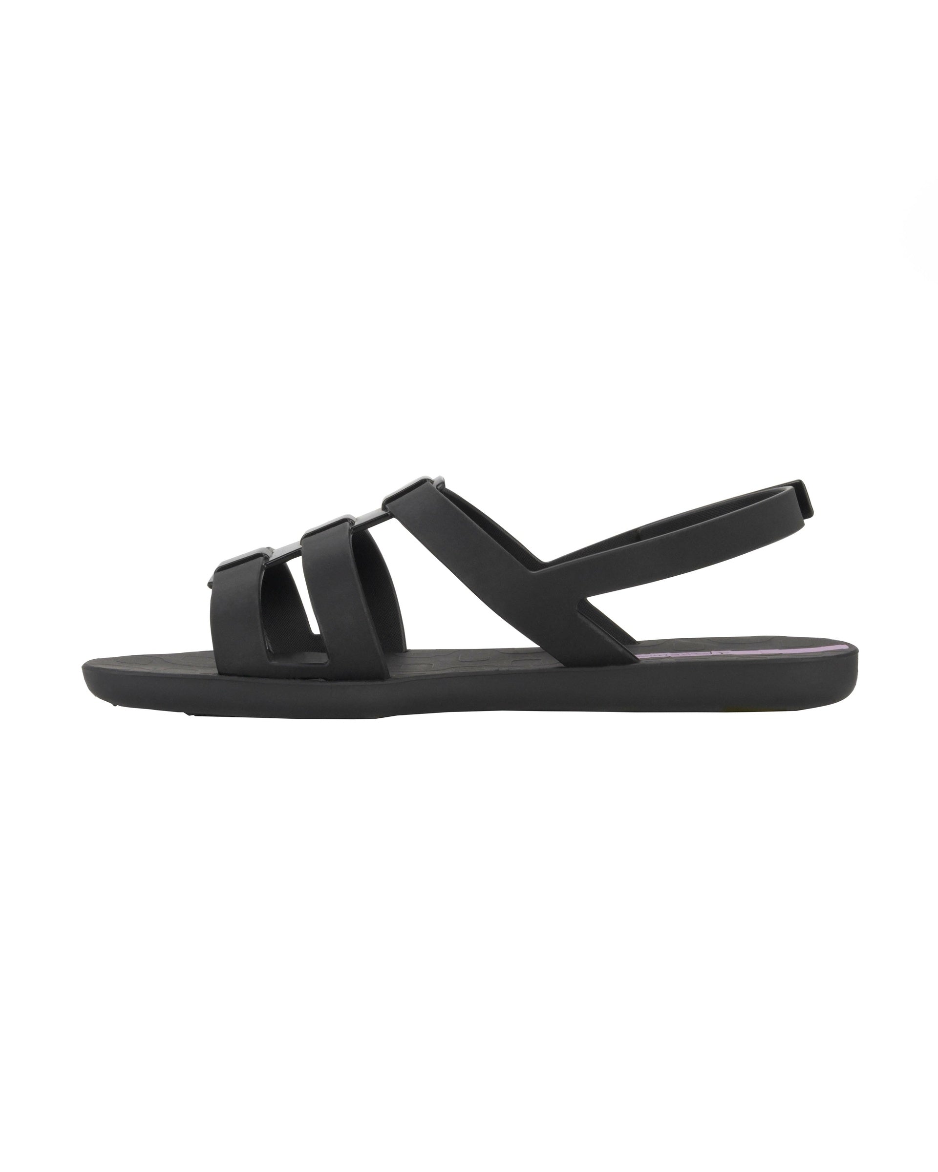 Inner side view of a black Ipanema Style women's sandal.