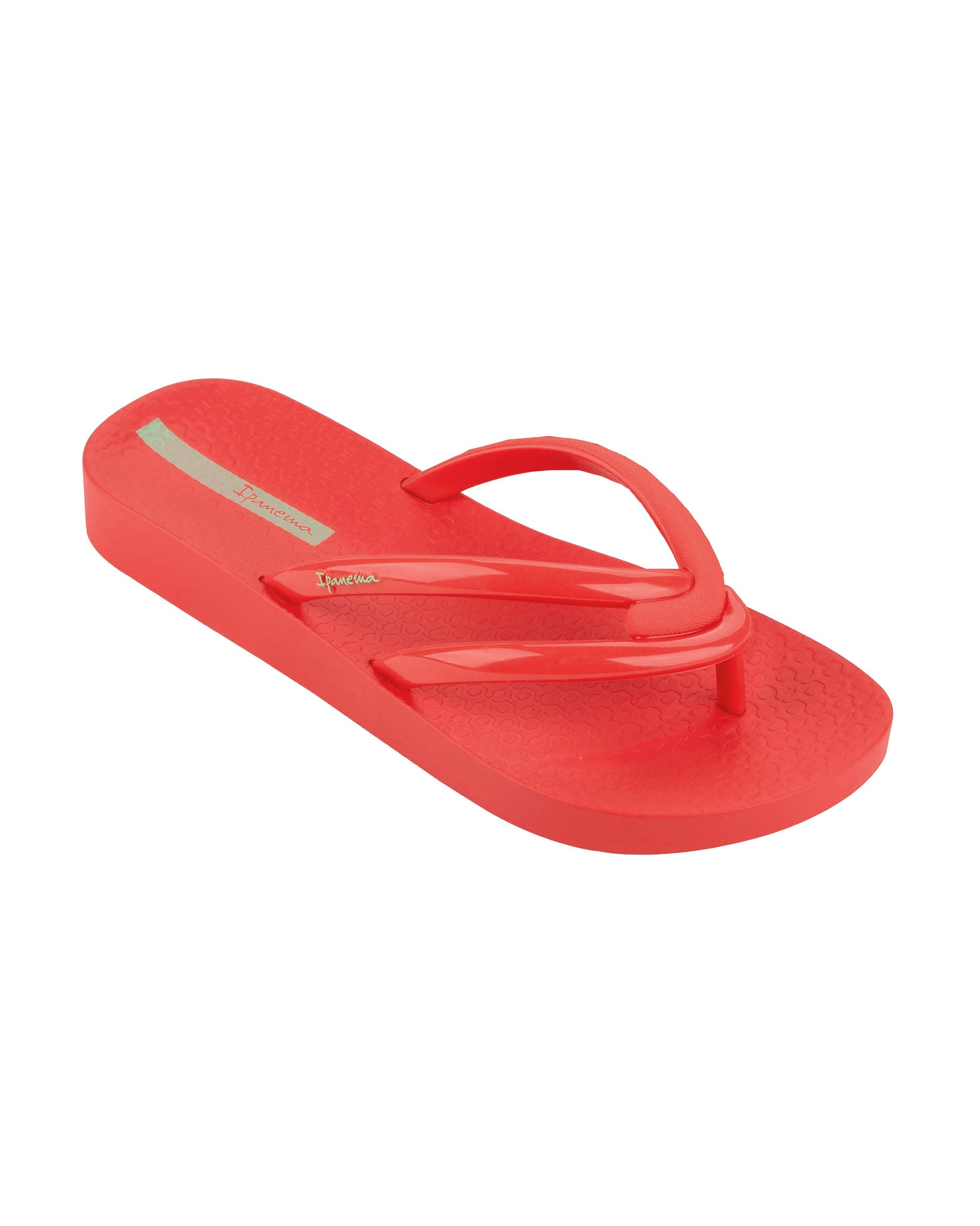 Angled view of a red Ipanema Comfy women's flip flop.