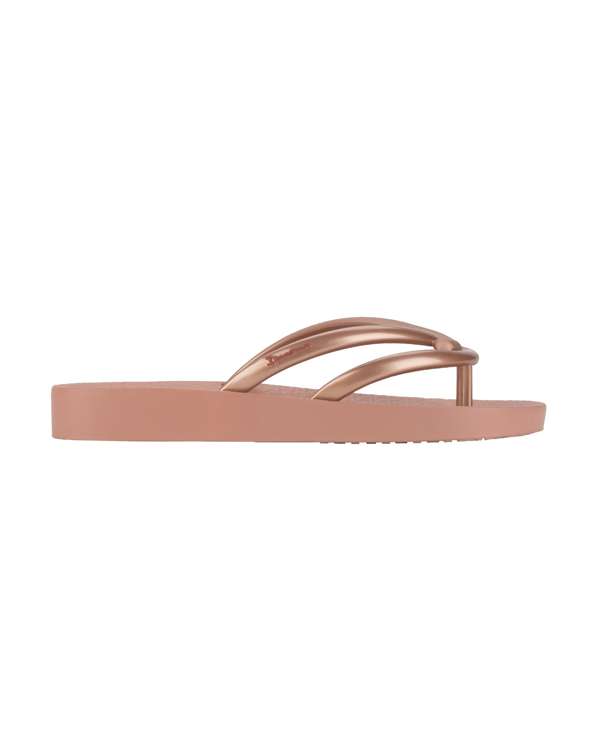 Outer side view of a pink Ipanema Comfy women's flip flop.
