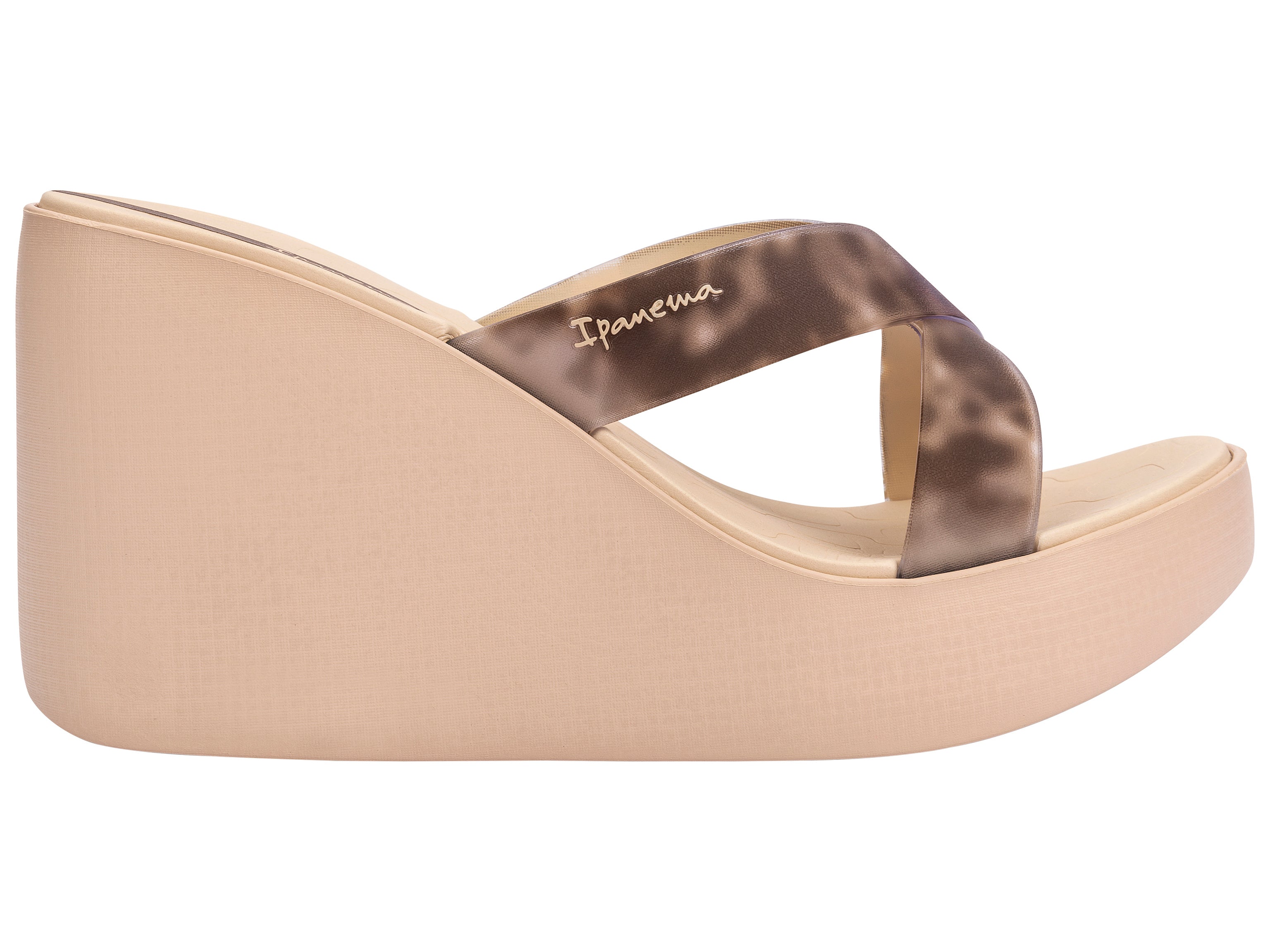 Outer side view of a beige Ipanema High Fashion women's wedge platform flip flop.