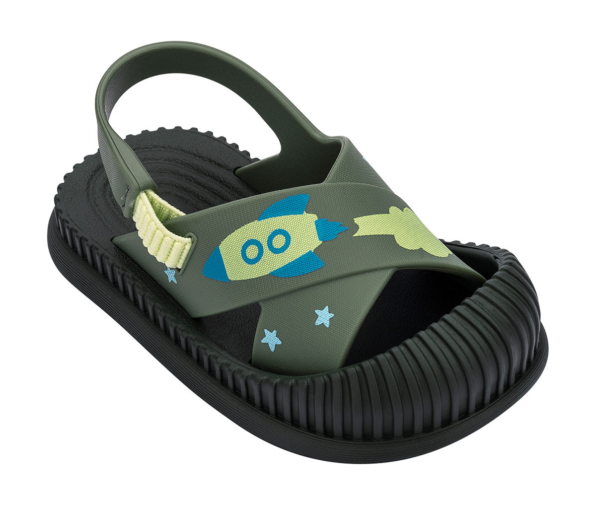 Angled view of a green Ipanema Cute baby sandal with rocket ship on the strap.