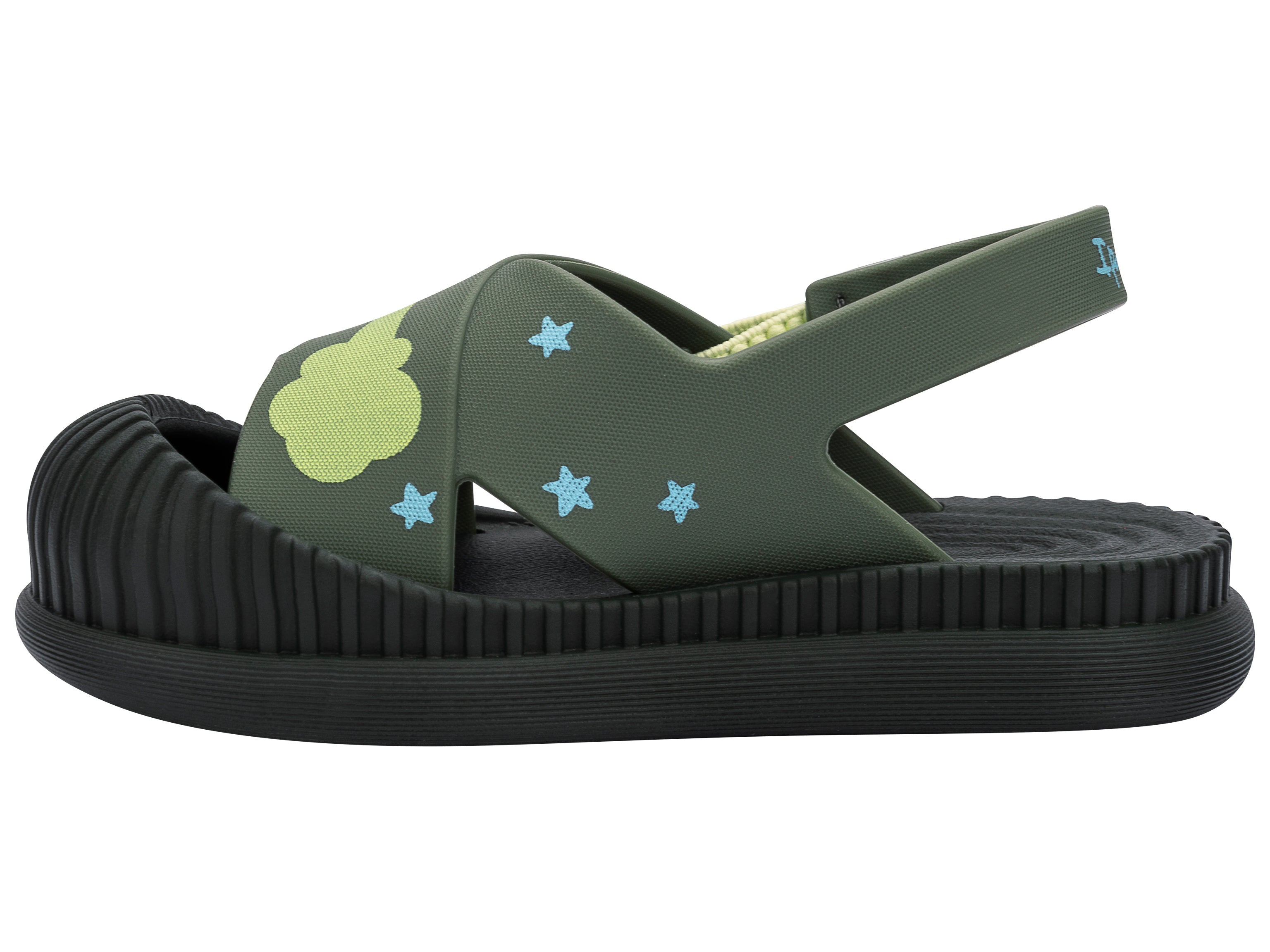 Inner side view of a green Ipanema Cute baby sandal with rocket ship on the strap.