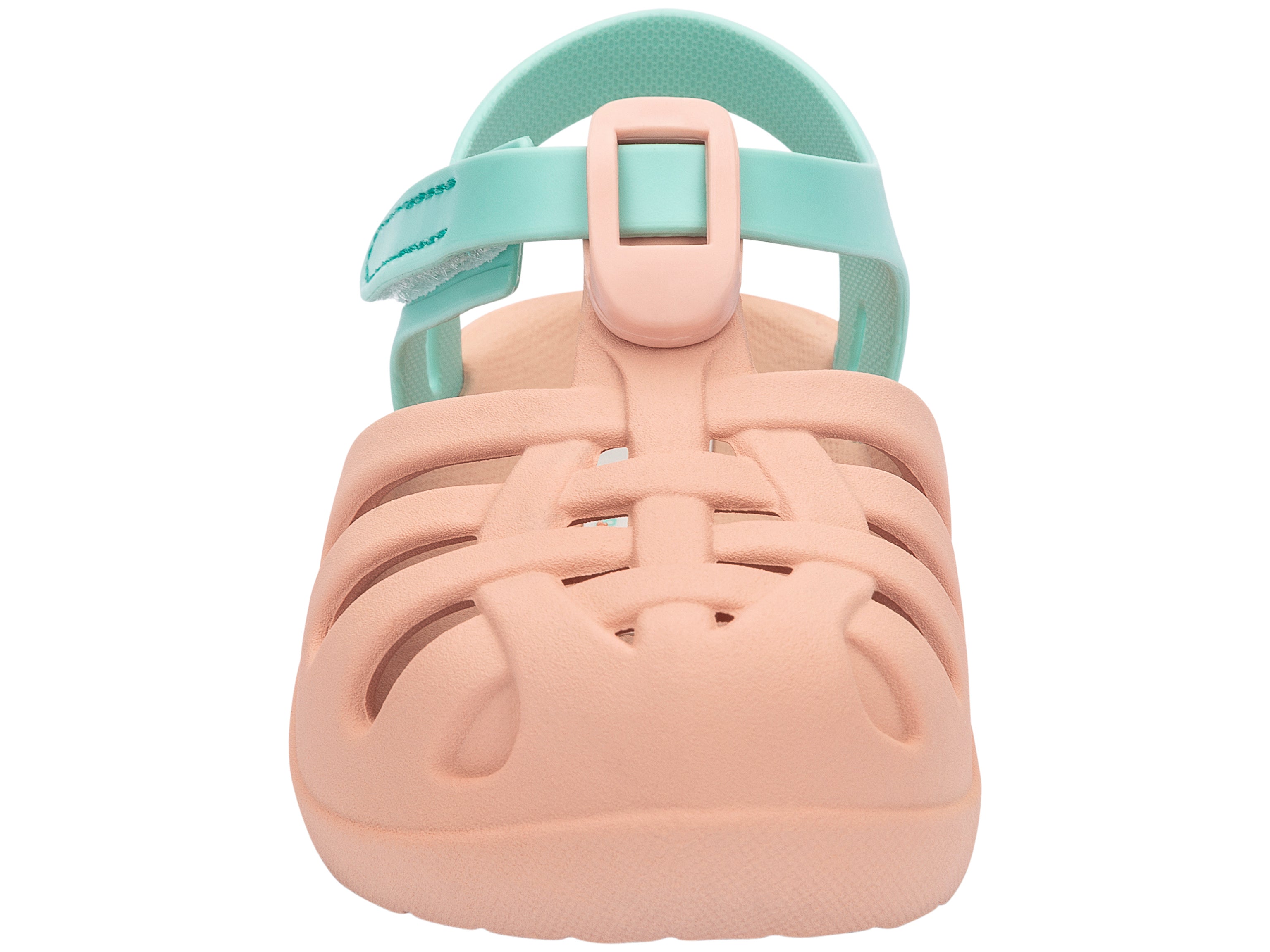 Front view of a beige Ipanema Summer Basic baby sandal with green strap.