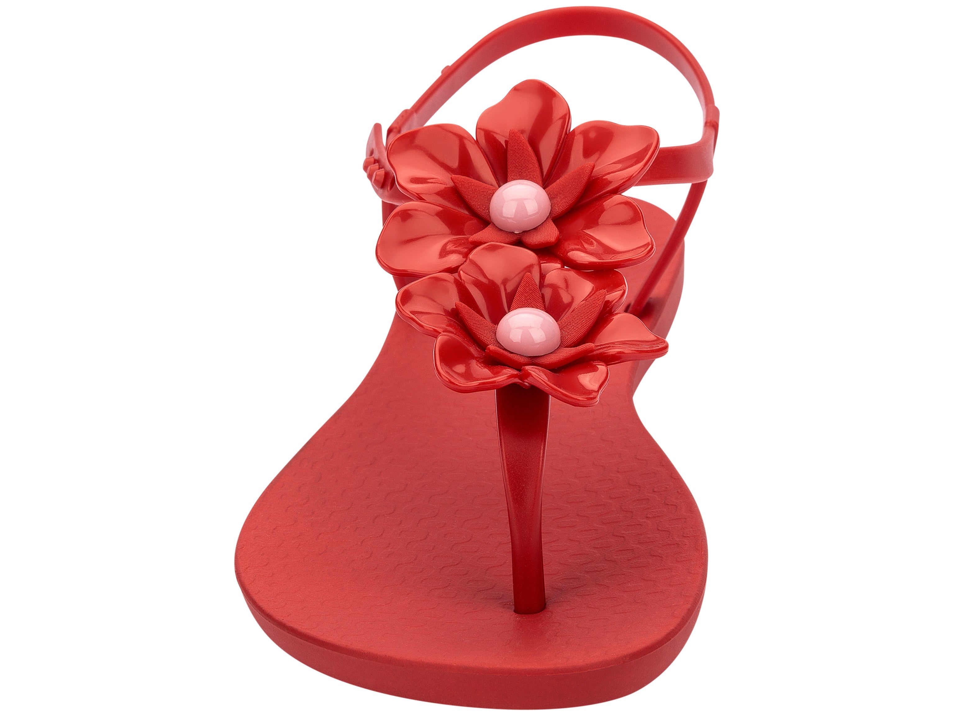 Front view of a Red Ipanema Duo Flowers women's t-strap sandal with two flowers.