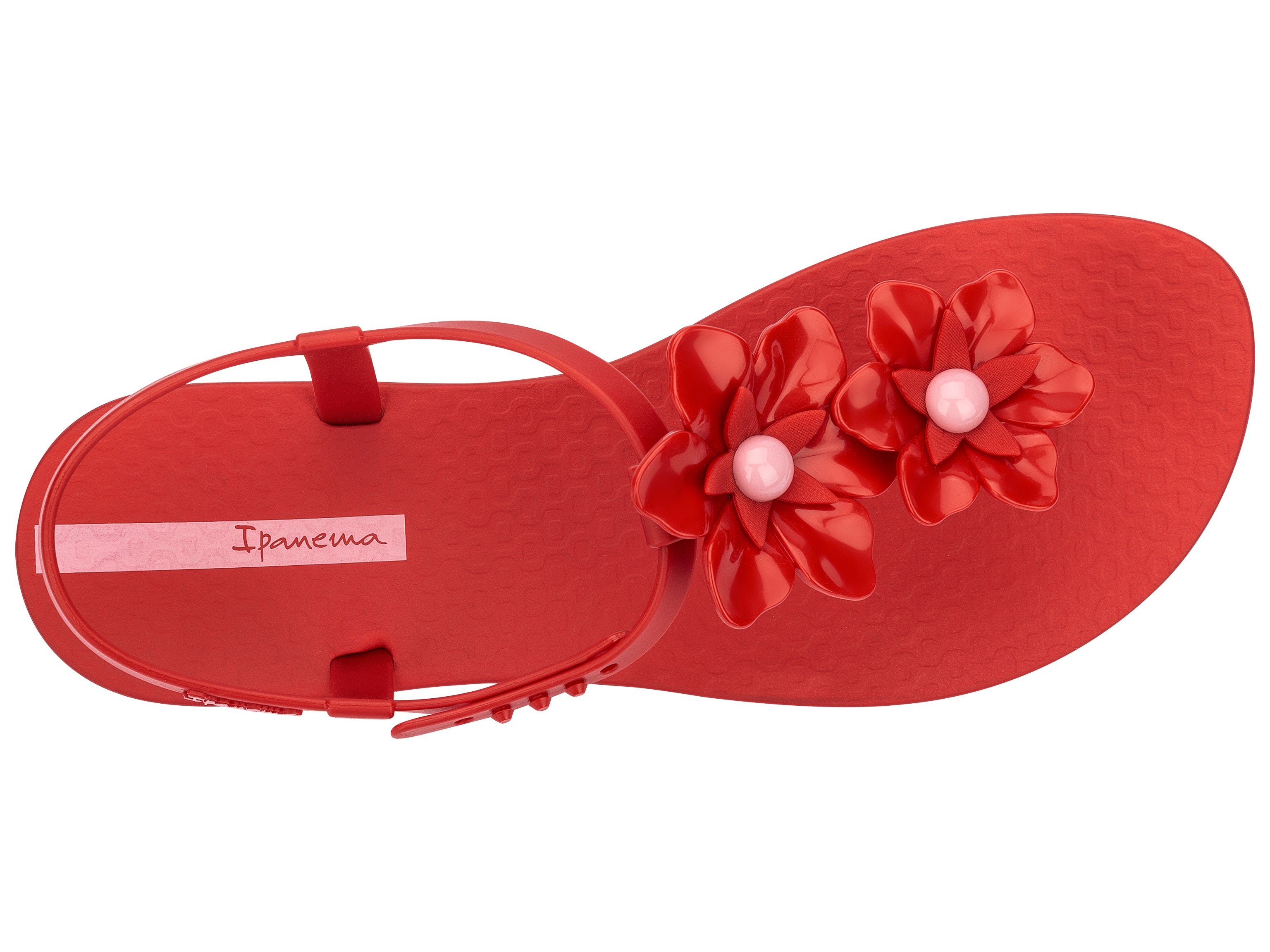 Top view of a Red Ipanema Duo Flowers women's t-strap sandal with two flowers.