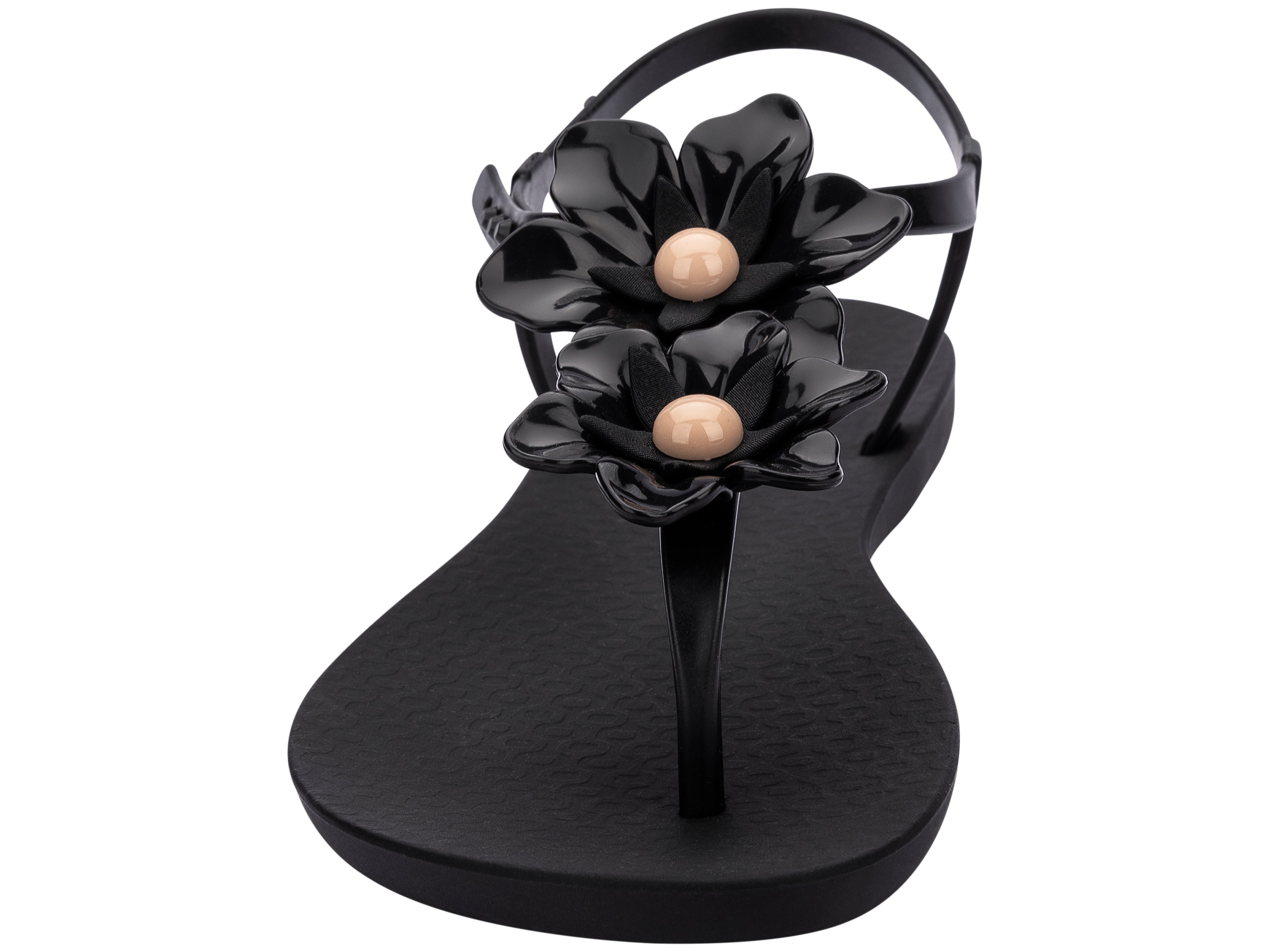 Front view of a black Ipanema Duo Flowers women's t-strap sandal with two flowers.