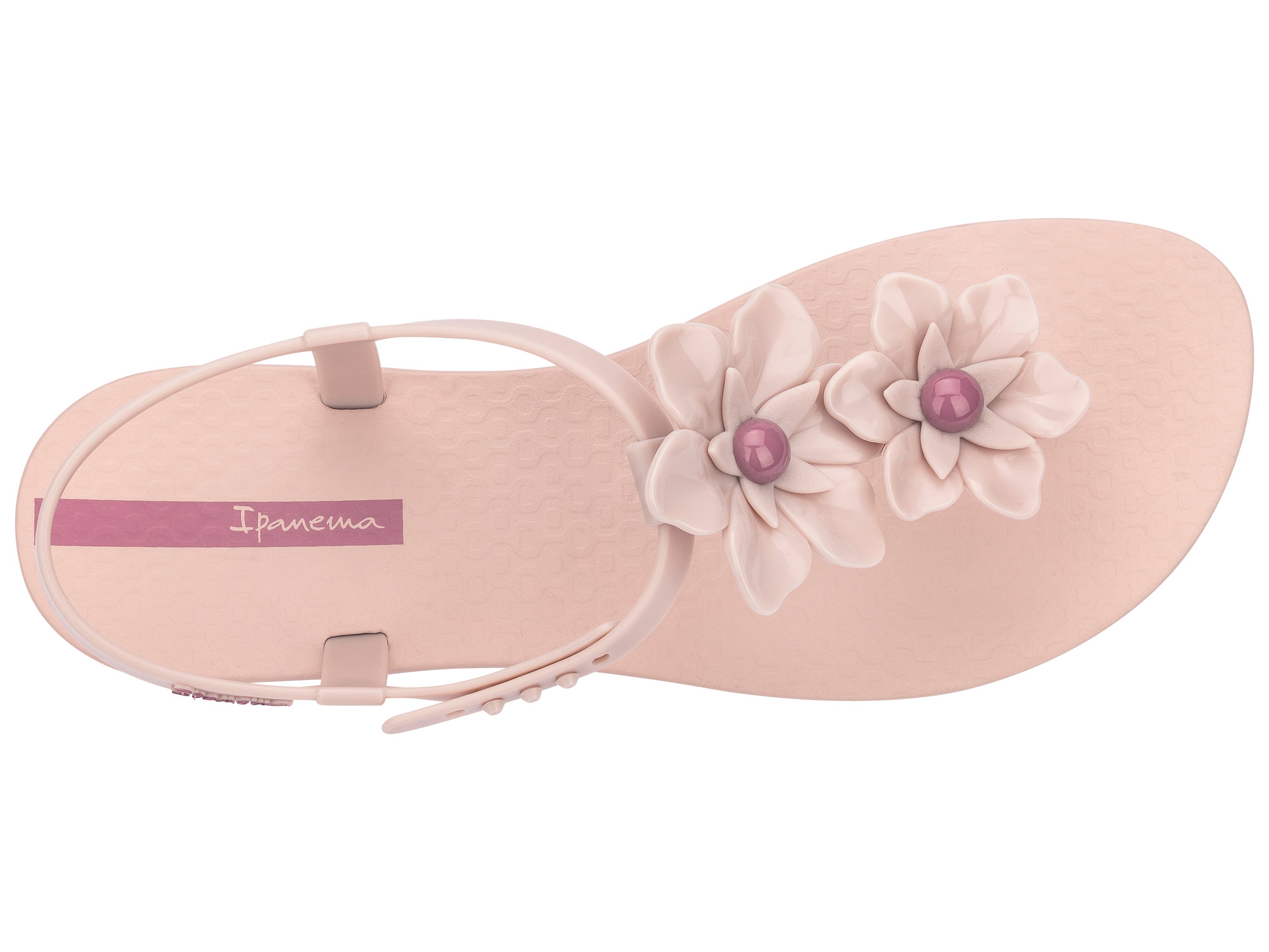 Top view of a pink Ipanema Duo Flowers women's t-strap sandal with two flowers.