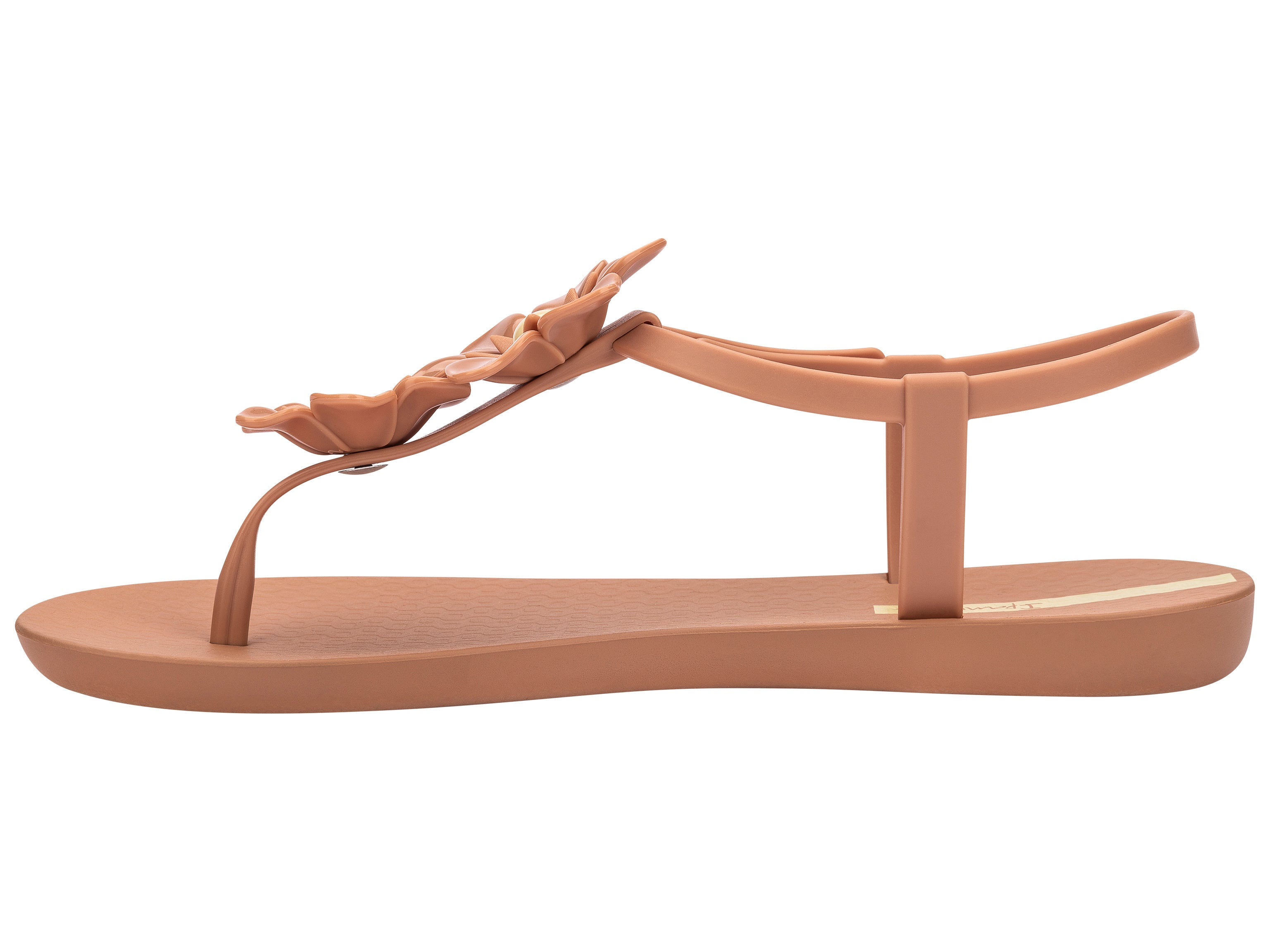 Inner side view of a brown Ipanema Duo Flowers women's t-strap sandal with two flowers.