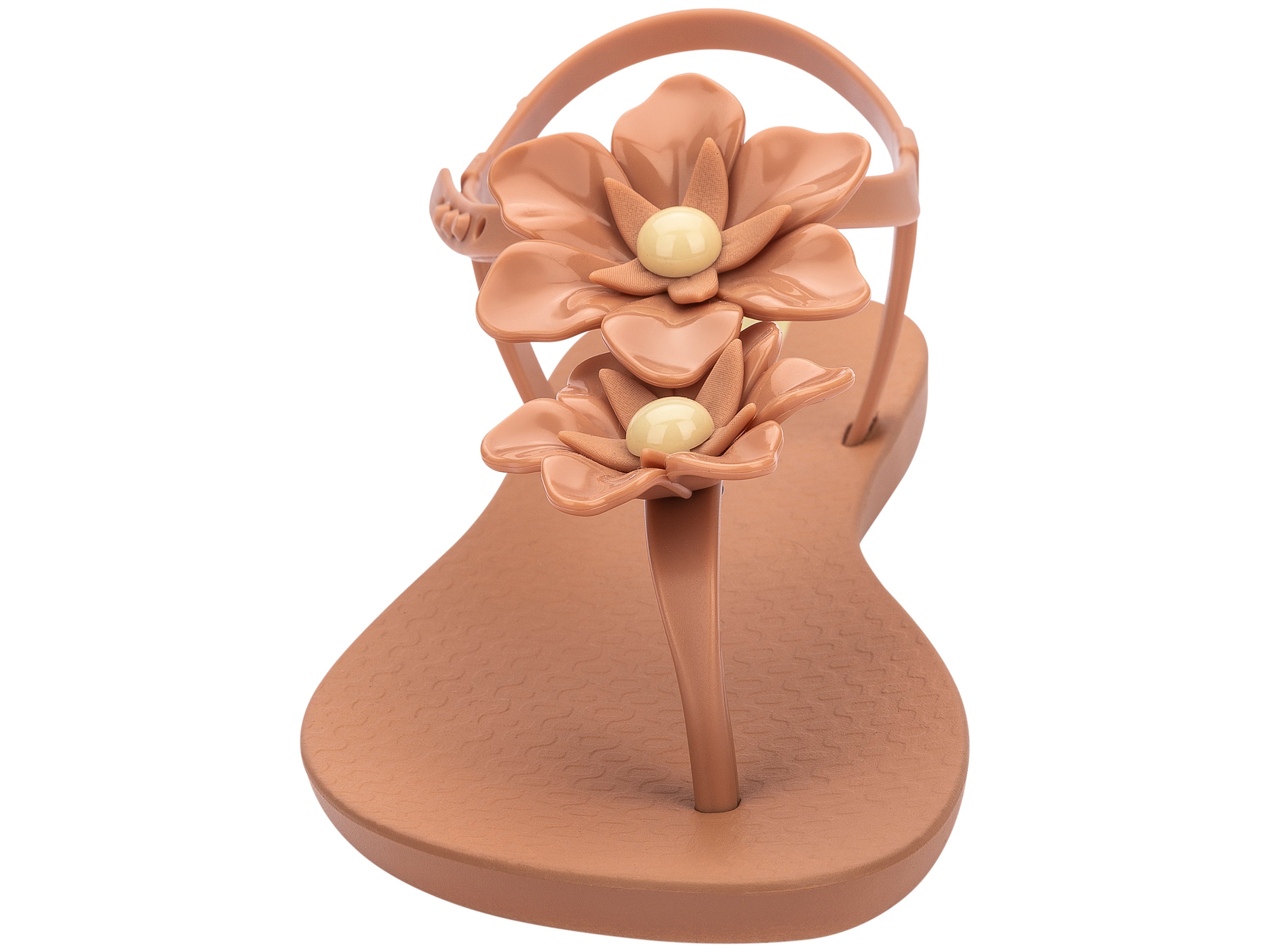 Front view of a brown Ipanema Duo Flowers women's t-strap sandal with two flowers.