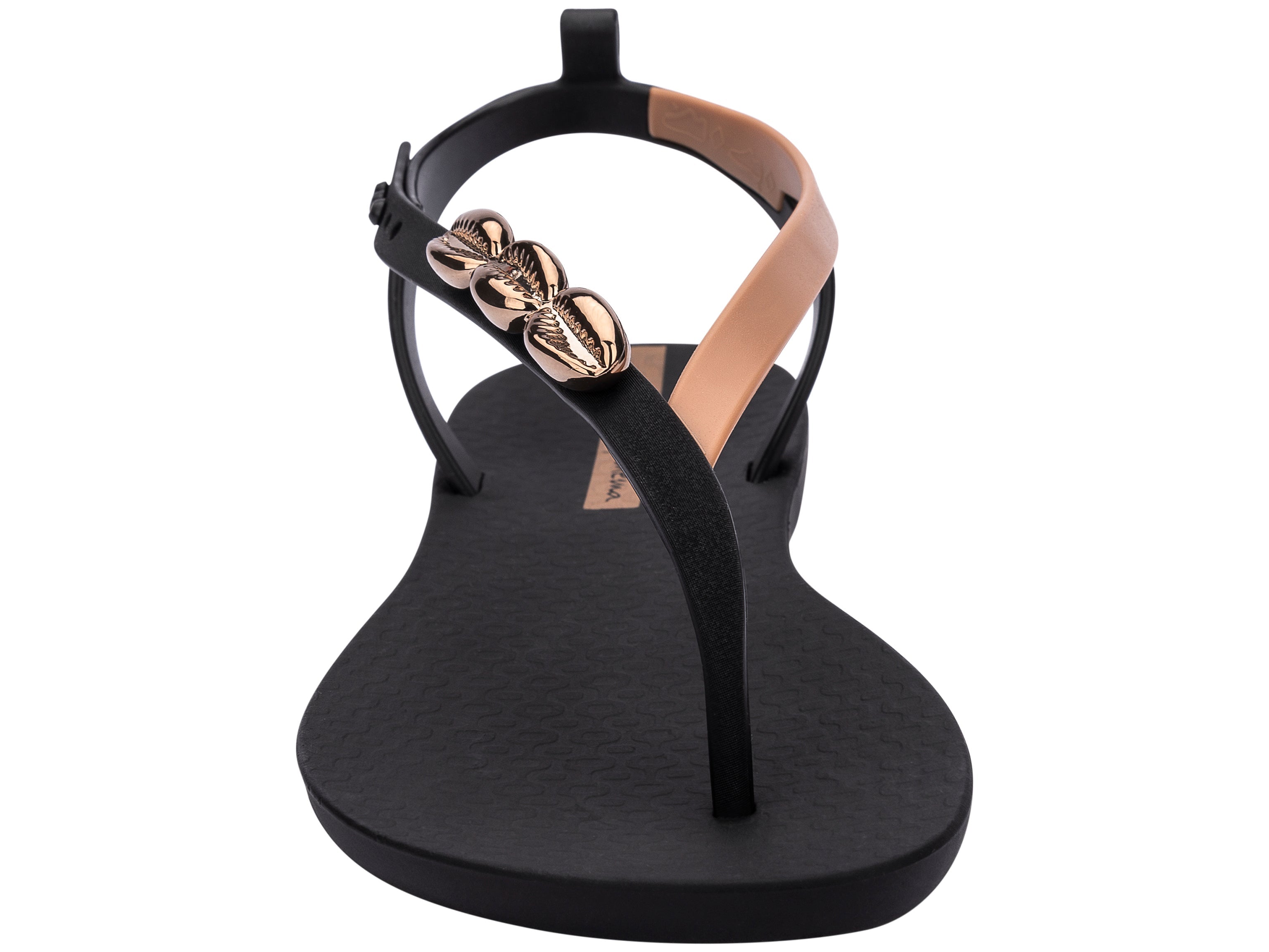 Front view of a black Ipanema Salty women's sandal with 3 gold shells on the strap.