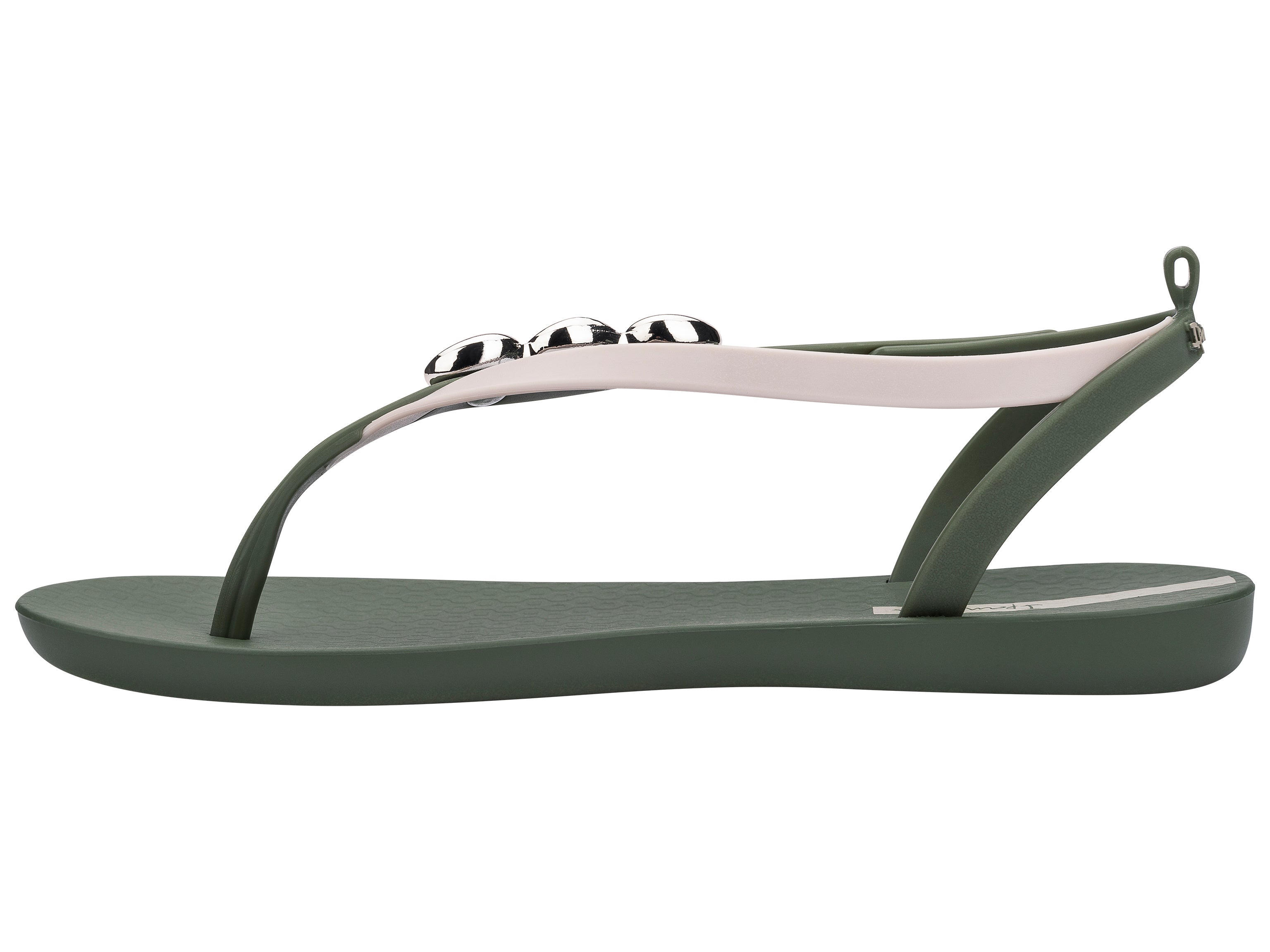 Inner side view of a green Ipanema Salty women's sandal with 3 silver shells on the strap.